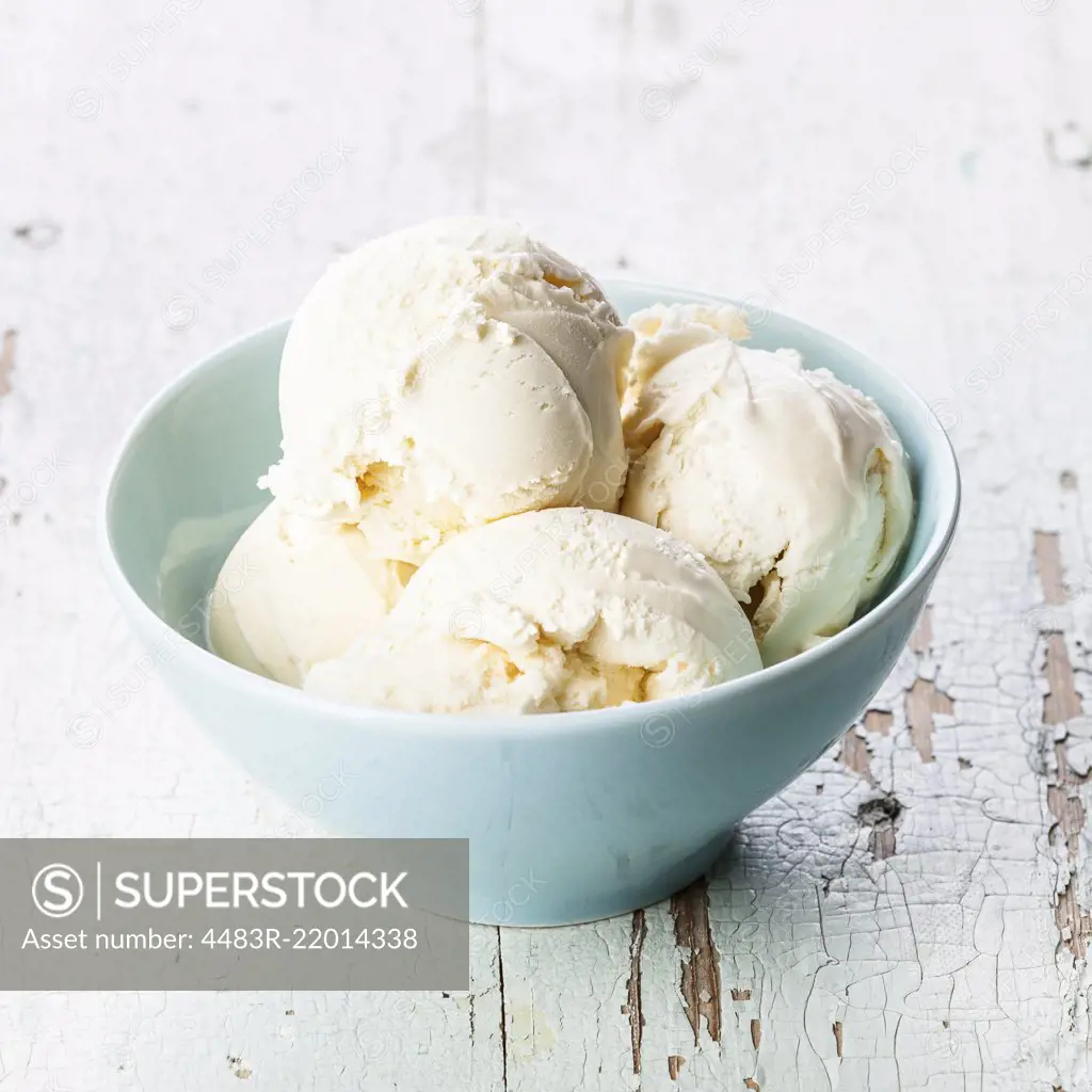 Vanilla ice cream in blue bowl