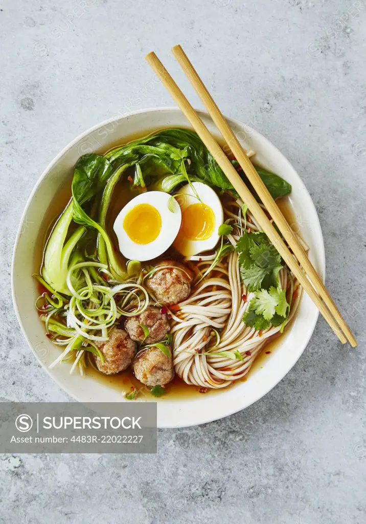 Asian Ramen noodles with egg and pak choi