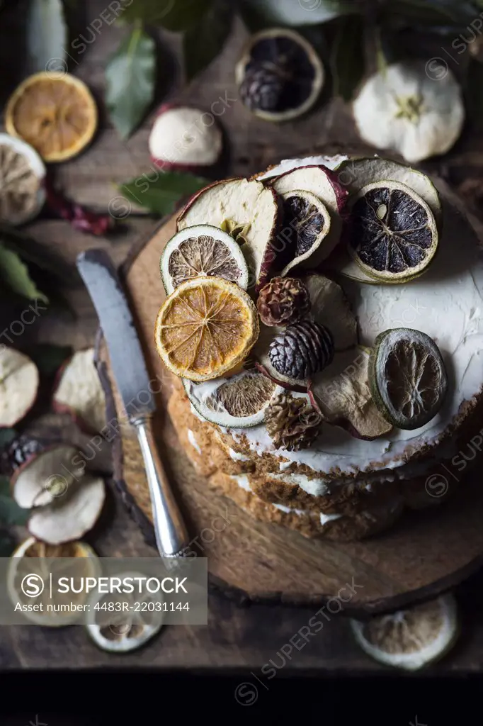 Angel cake with dried fruit on table