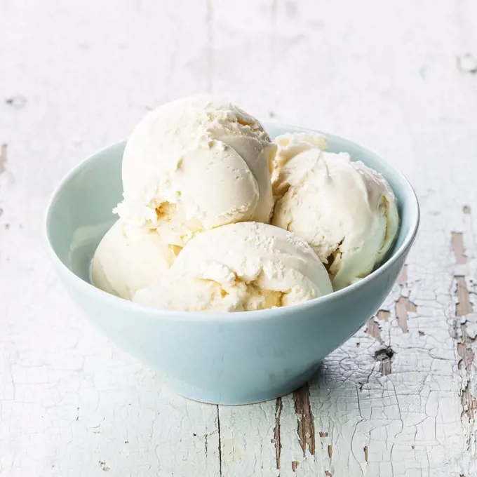 Vanilla ice cream in blue bowl