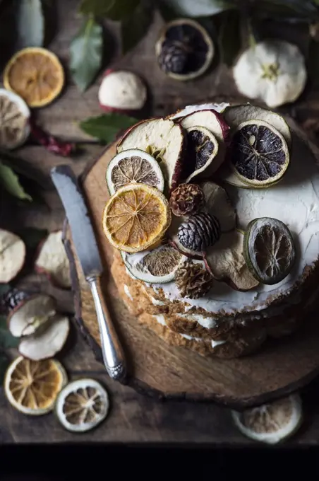 Angel cake with dried fruit on table