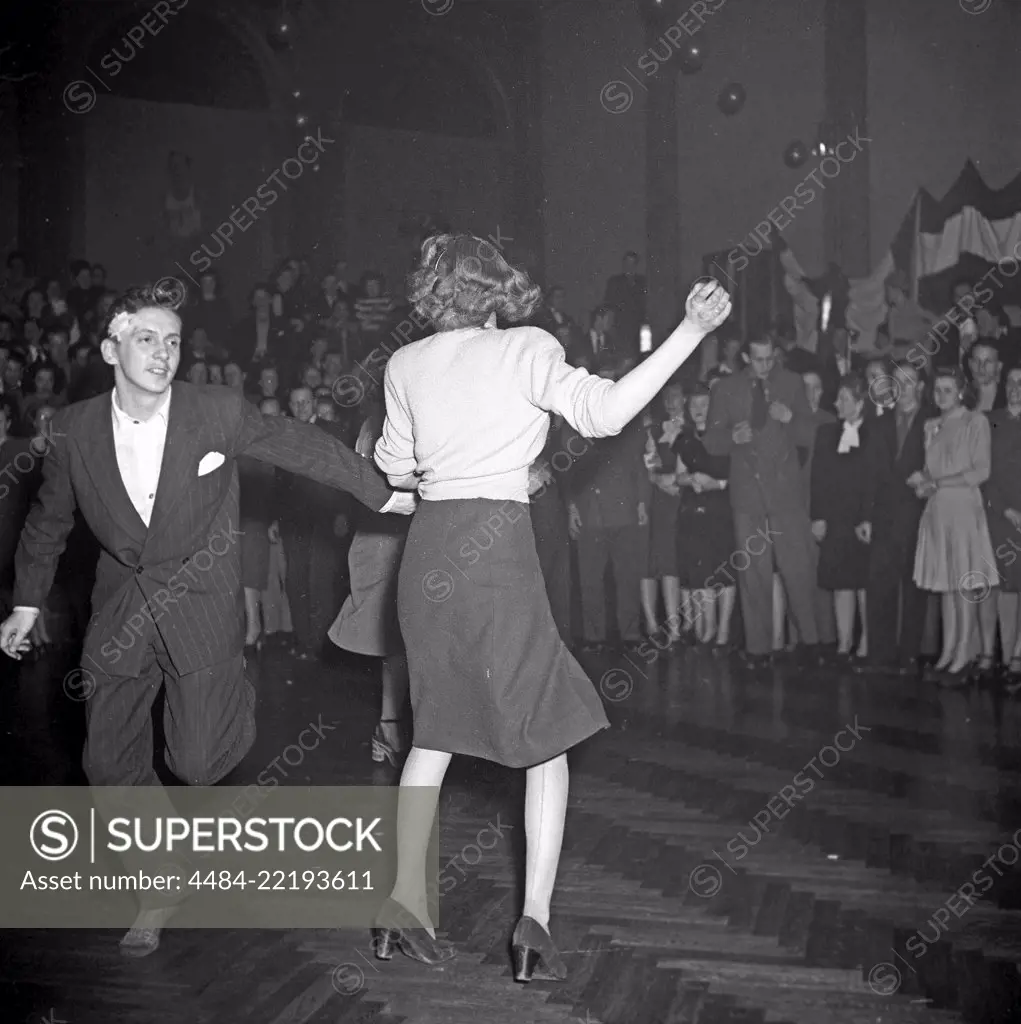 Jitterbug dance. A dance popularized in the United states and spread by American soldiers and sailors around the world during the Second world war. Pictured here a young couple when dancing the Jitterbug dance 1948 during a competition dance event. Photo: Kristoffersson ref AH22-1