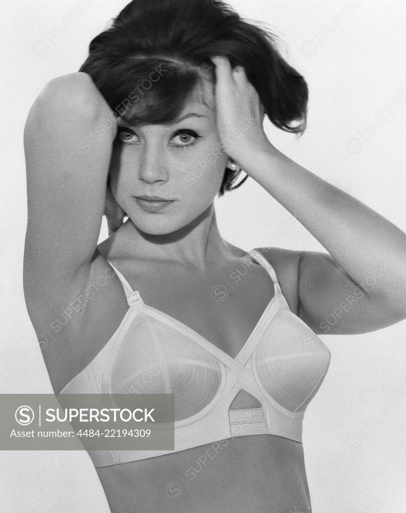 Image of A woman is posing in typical 1960s bullet bra, Sweden