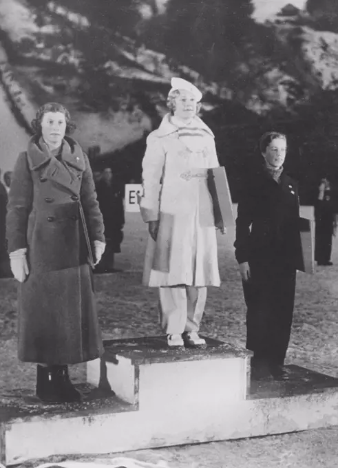 Olympic winter games 1936 Garmisch-Partenkirchen. The prize ceremony for womens figure skating with winner in the middle, Sonja Henie. Second is british Cecilia Colledge and third swedish Vivi-Anne Hultén.