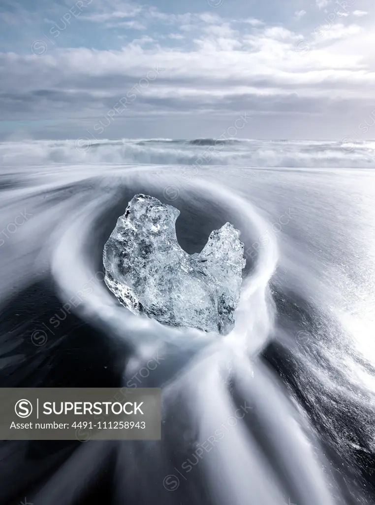 huge block of ice on coast in Diamond beach Iceland