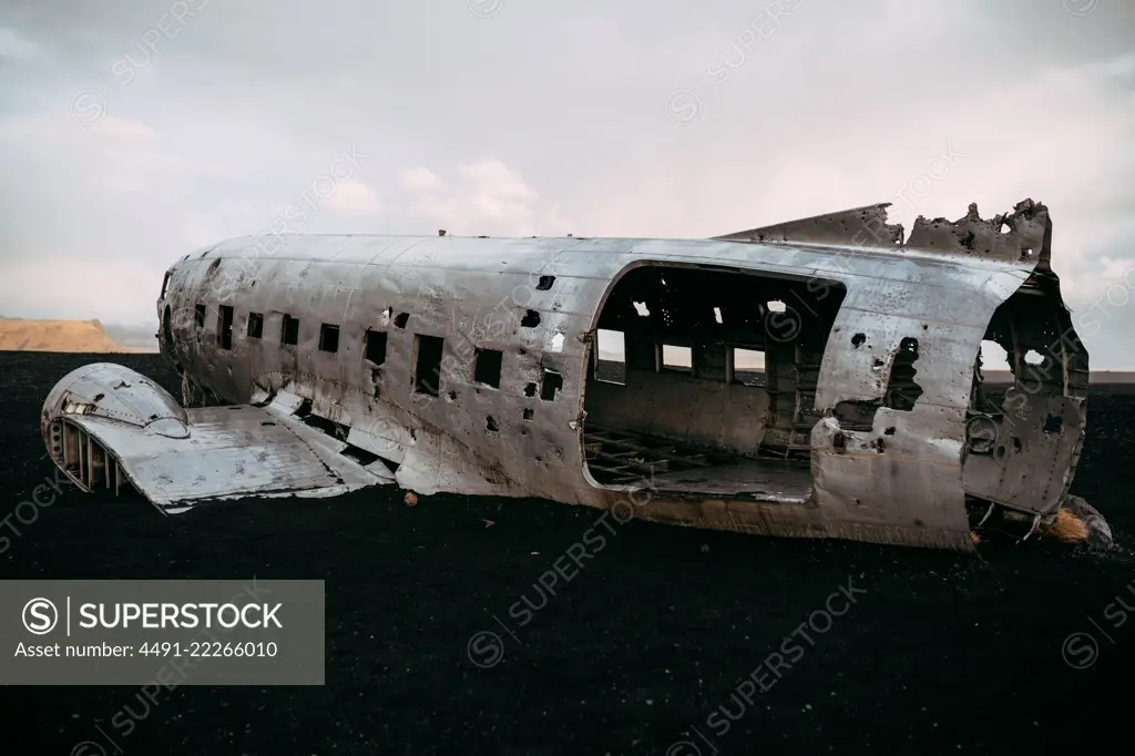 Damaged plane in desolated field