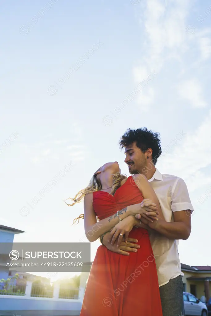 Loving passionate couple embracing