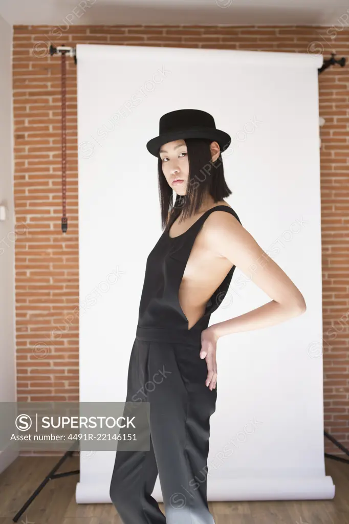 Stylish pretty Asian woman in hat