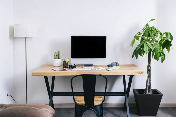 Modern creative home workspace with computer