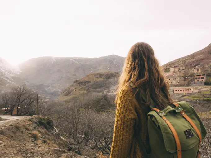 Female tourist with backpack