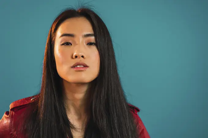 Portrait of young stylish Asian woman