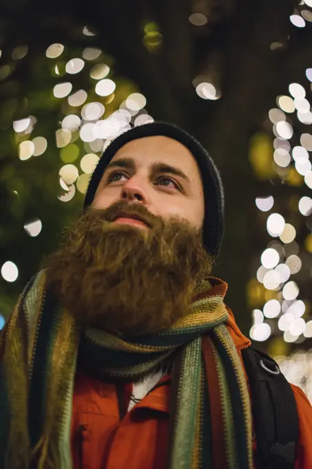 Handsome man posing at lights