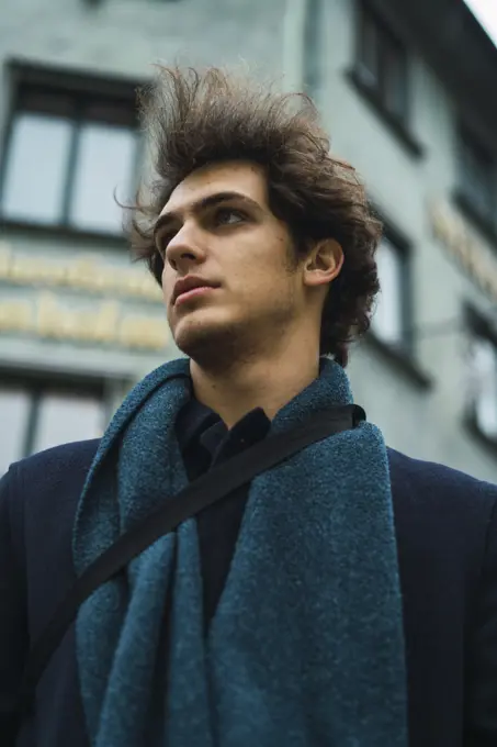 Young man posing on street