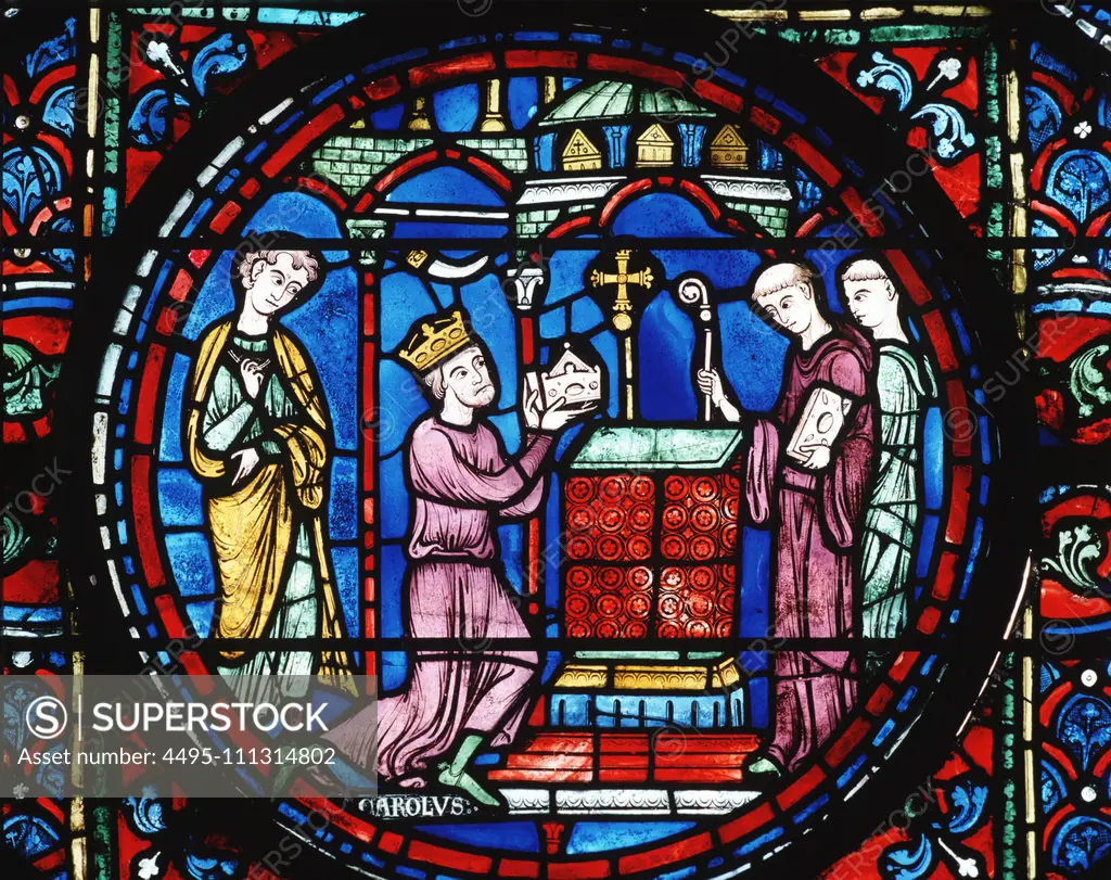 Charlemagne kneels before the altar in Cathedral of Aix-la-Chapelle, young Roland behind, Charlemagne window no 38,  13th century, Chartres cathedral