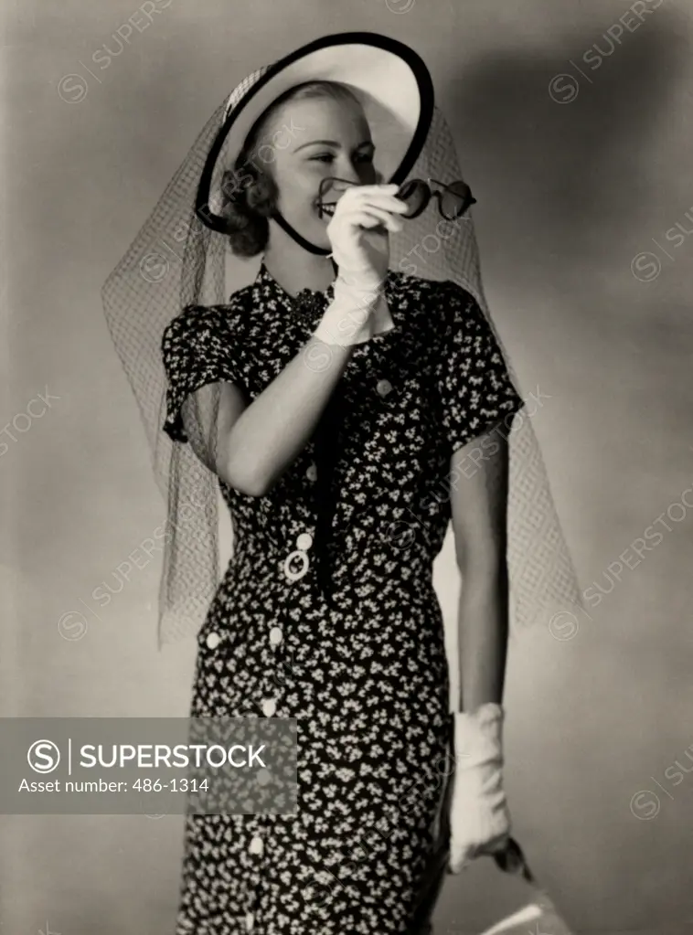 Portrait of woman wearing sun hat