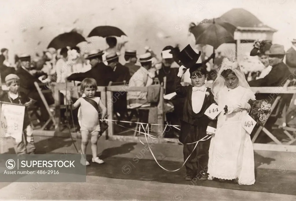 Children performing wedding during contest