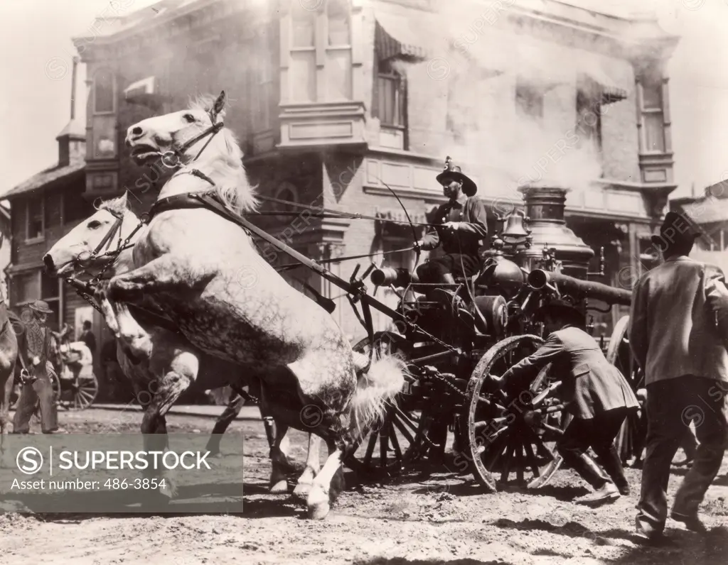 Fireman on old fire engine