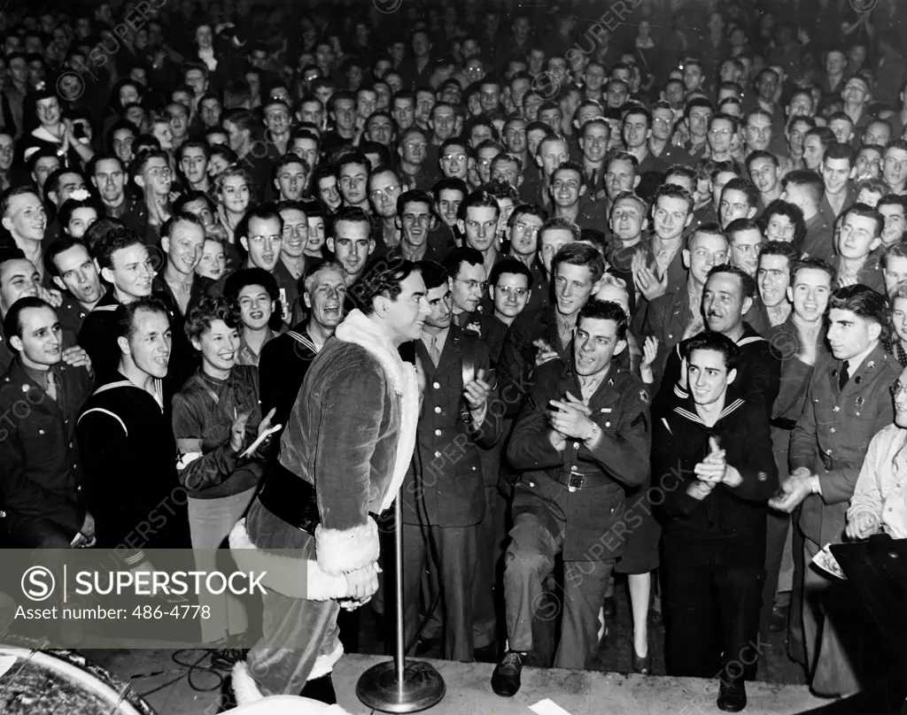 Eddie Cantor dressed as Santa Clouse at Hollywood Canteen