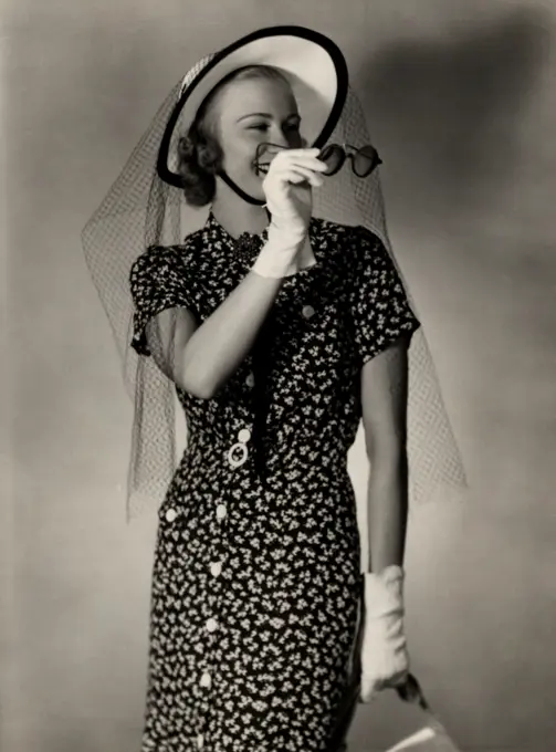 Portrait of woman wearing sun hat