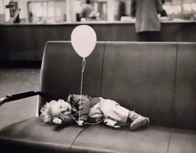 Boy sleeping on sofa