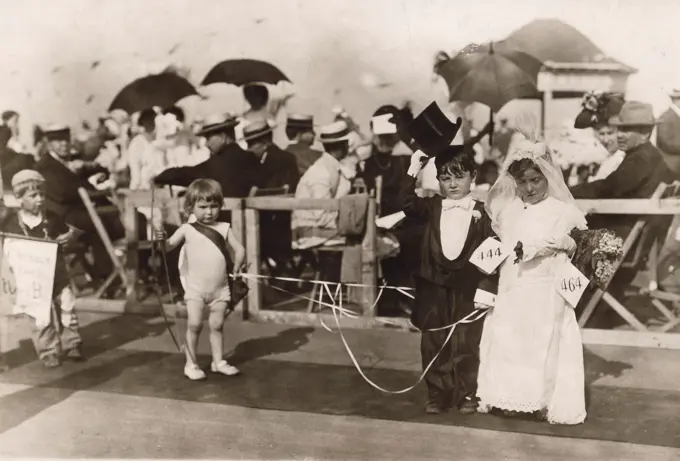 Children performing wedding during contest