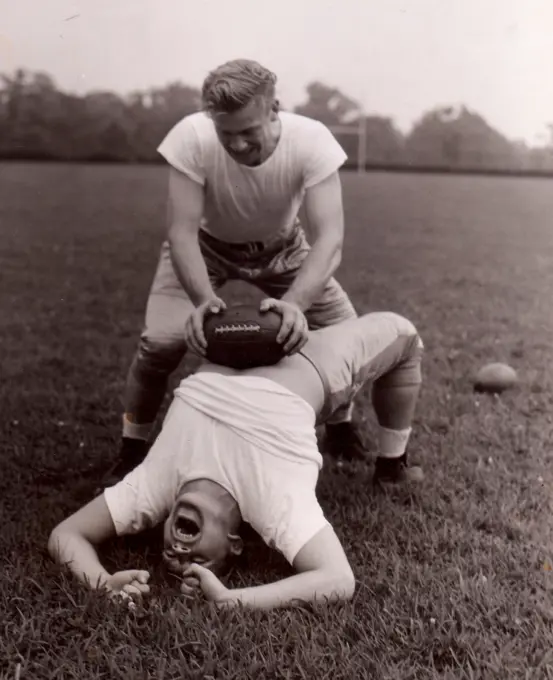 Steve Filipowicz getting some of kinks rubbed off breadbasket by George Cheverko, Steve Filipowicz, All American passer and veteran backfield star, is getting some of the kinks rubbed off the breadbasket by George Cheverko, the back who flashed as a scoring sophomore last Fall.