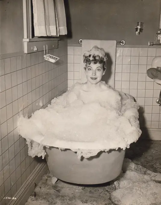 1948, Young woman bathing