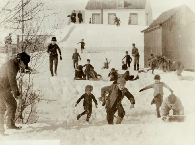 Children playing outside in winter