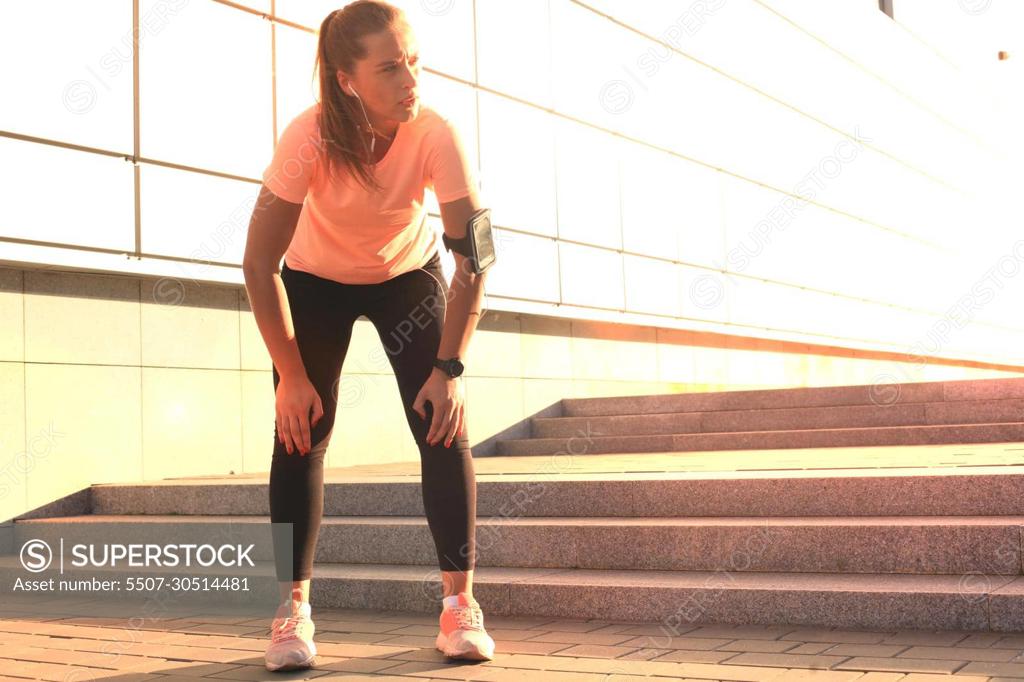 Sport Teenage Girl Running Outdoor. Young Woman Running In Field At  Evening. Back View Of Running Lass On Meadow At Sunset. Sporty Girl Run  Away From Camera. Fitness Training Outdoor Stock Photo