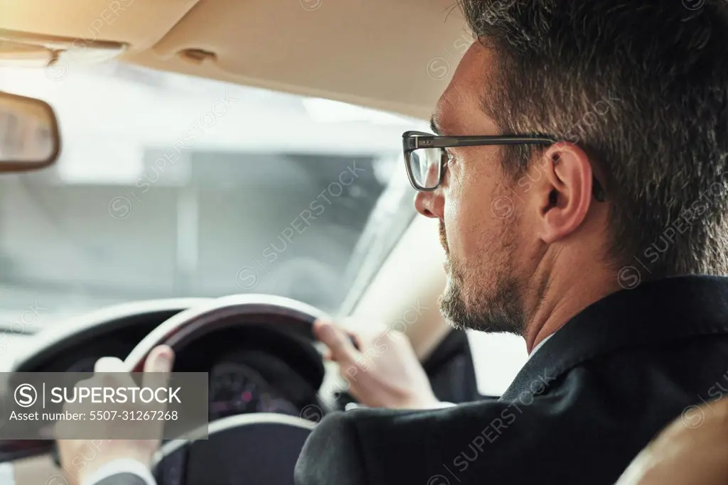 Headed into the office. Cropped shot of a businessman on his morning commute to work.