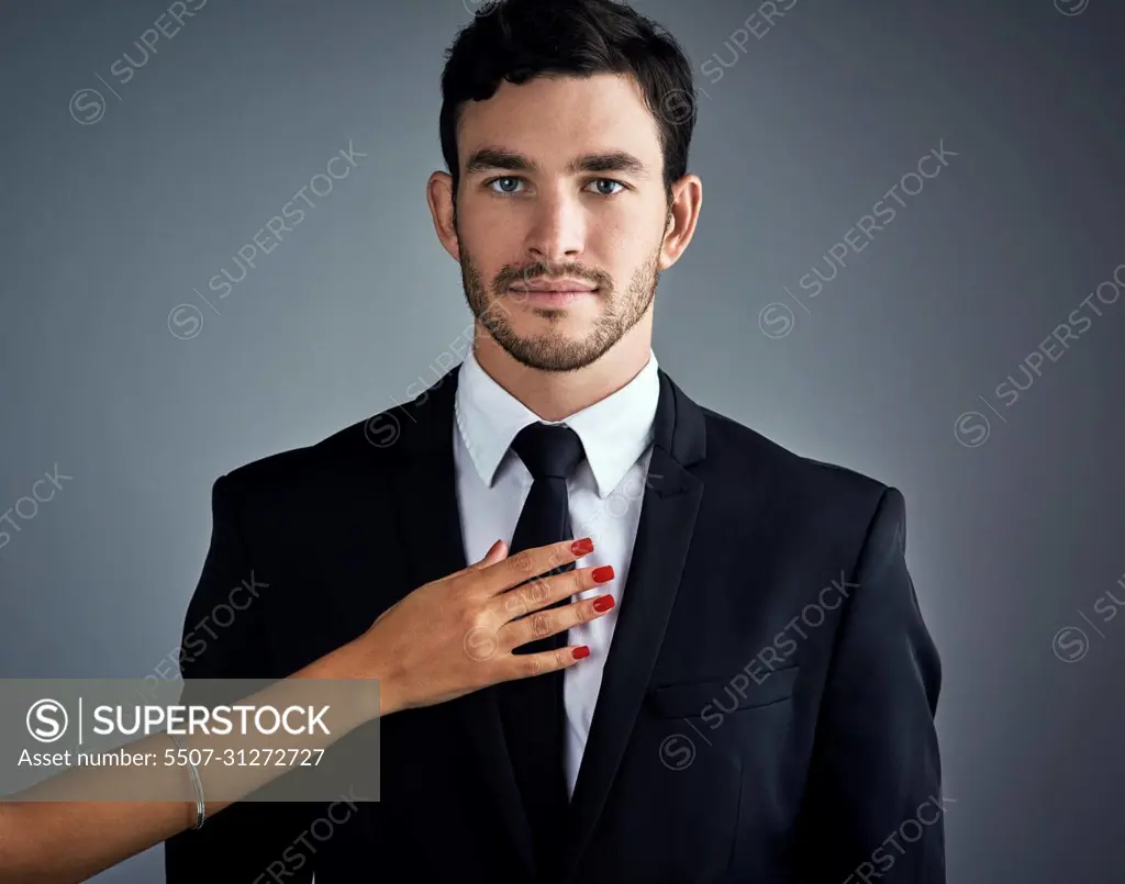 Success is the ultimate aphrodisiac. Studio portrait of a handsome