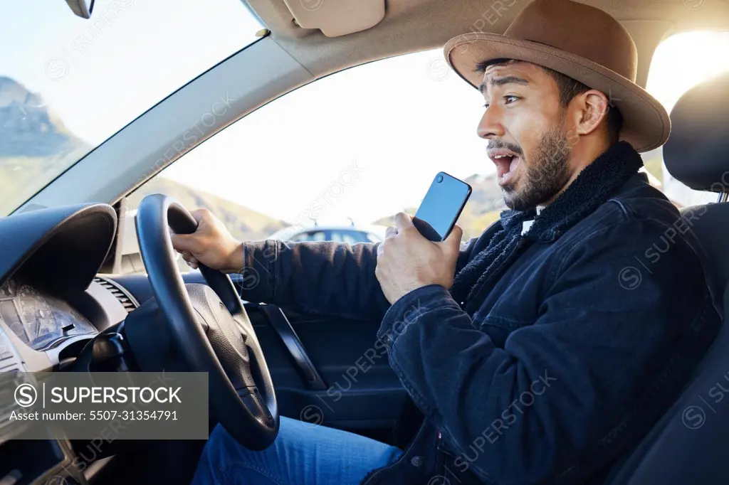 Wherever you get to is better than where you started. Shot of a young man singing in the car.