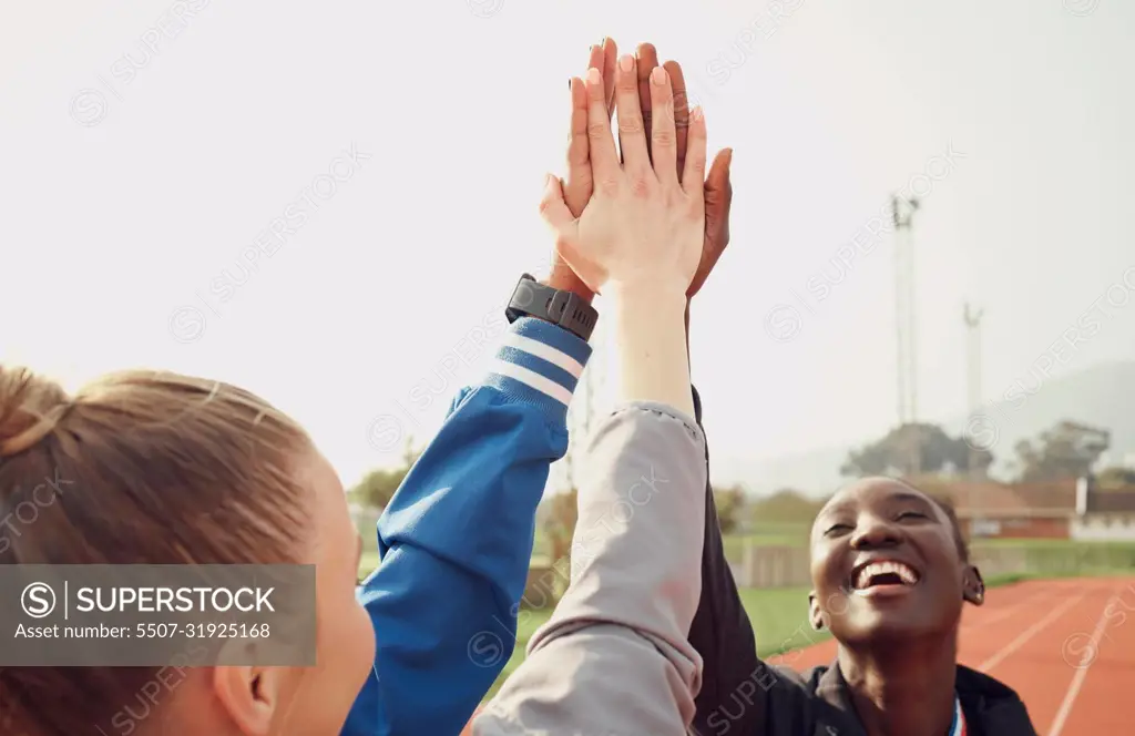 Therell never be another like us. a group of athletes high fiving one another.