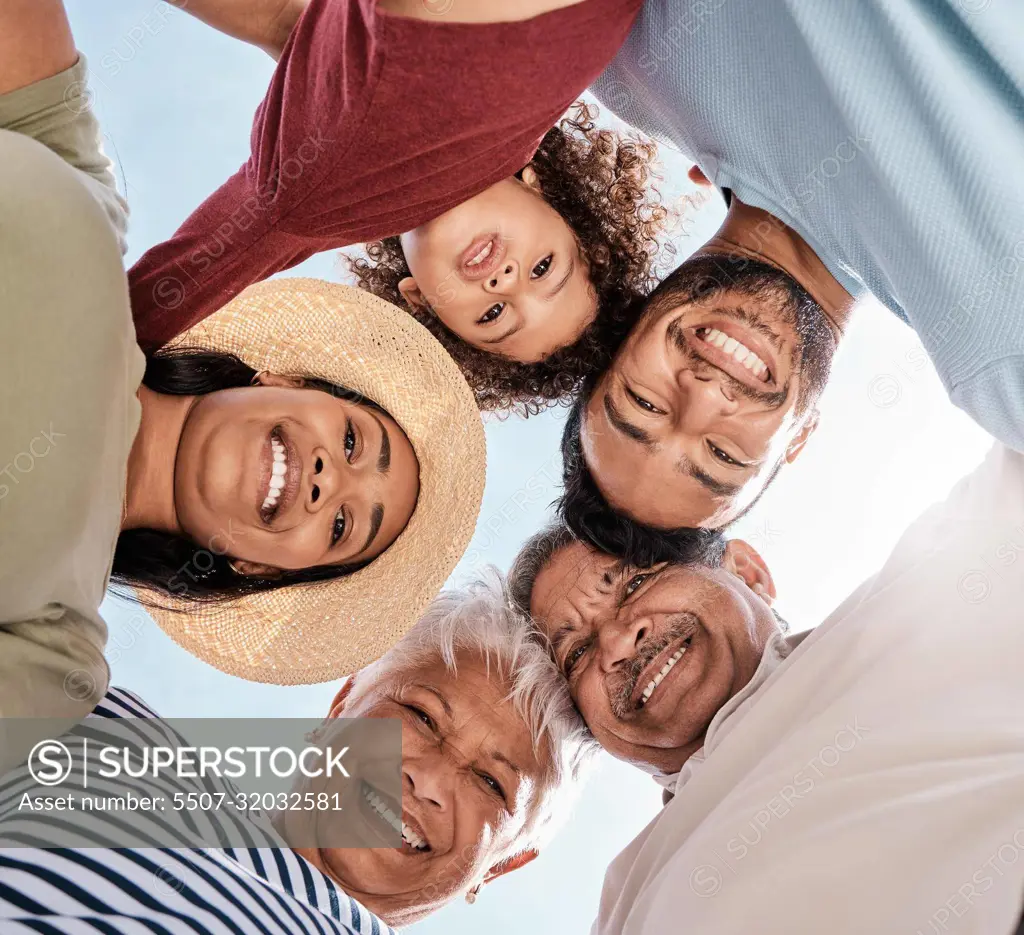 Its always fun when the family gets together. a multi-generational family spending the day at the beach.