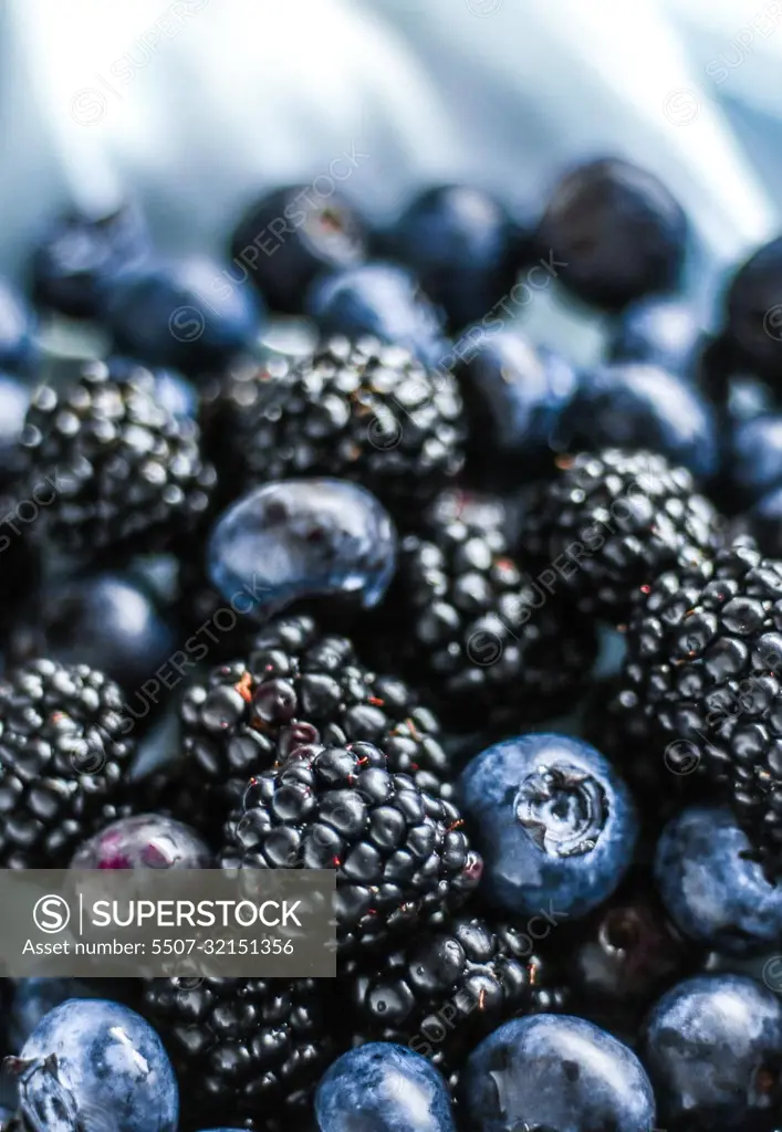 bluberries and blackberries - fresh fruits and healthy eating styled concept