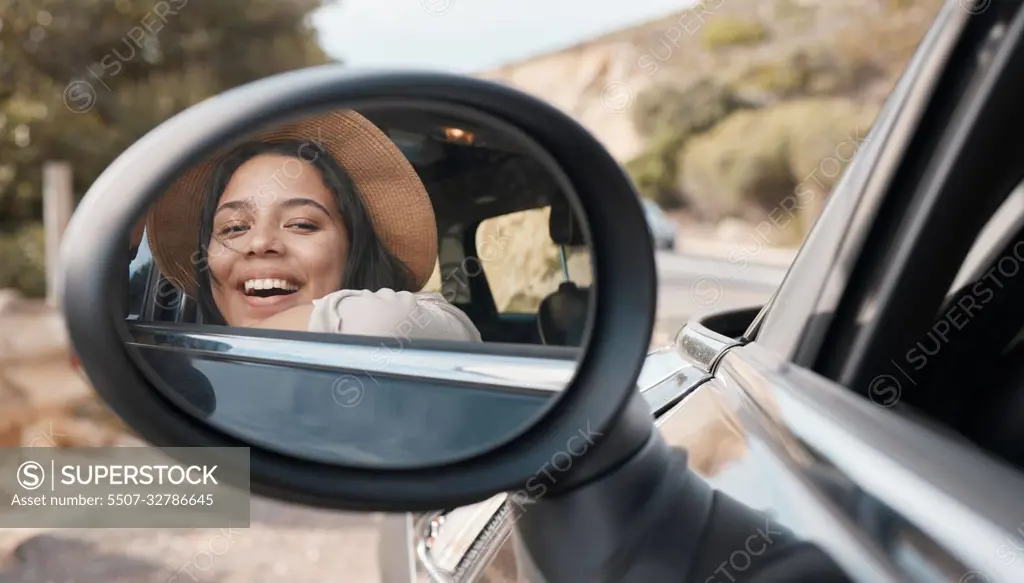 Car mirror, happy road trip and black woman feeling happy about motor transport and freedom. Travel, summer vacation and transportation of a women with a smile traveling for a holiday with happiness