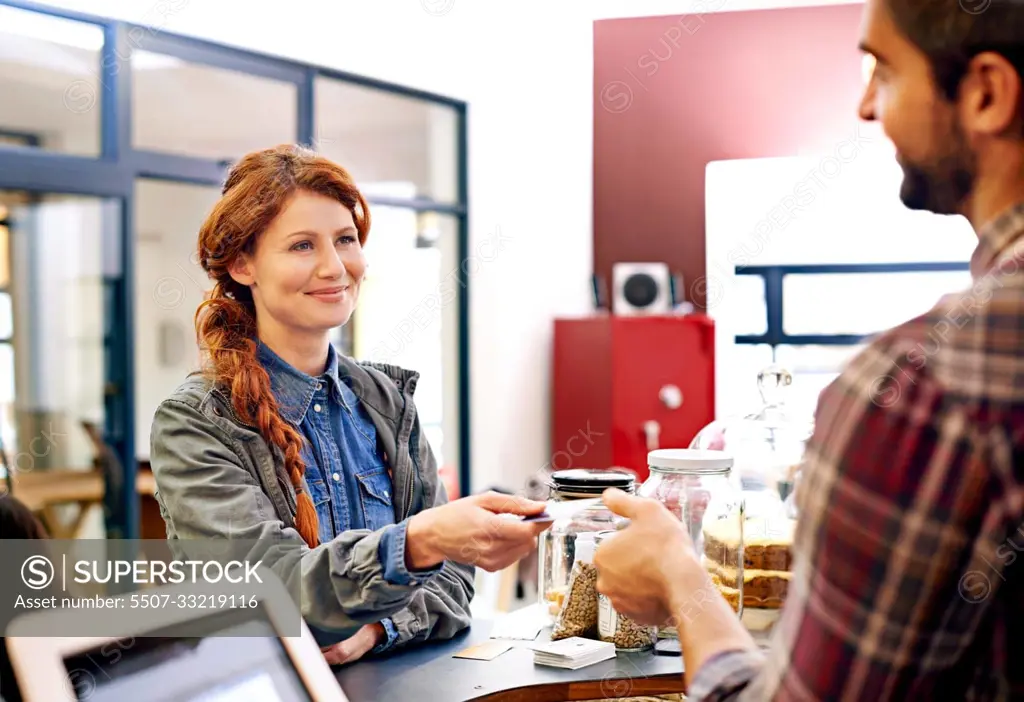 Woman smile, customer and credit card at a coffee shop for payment with a order at restaurant. Female person, happiness and diner to pay and buy at cafe with male store assistant and barista