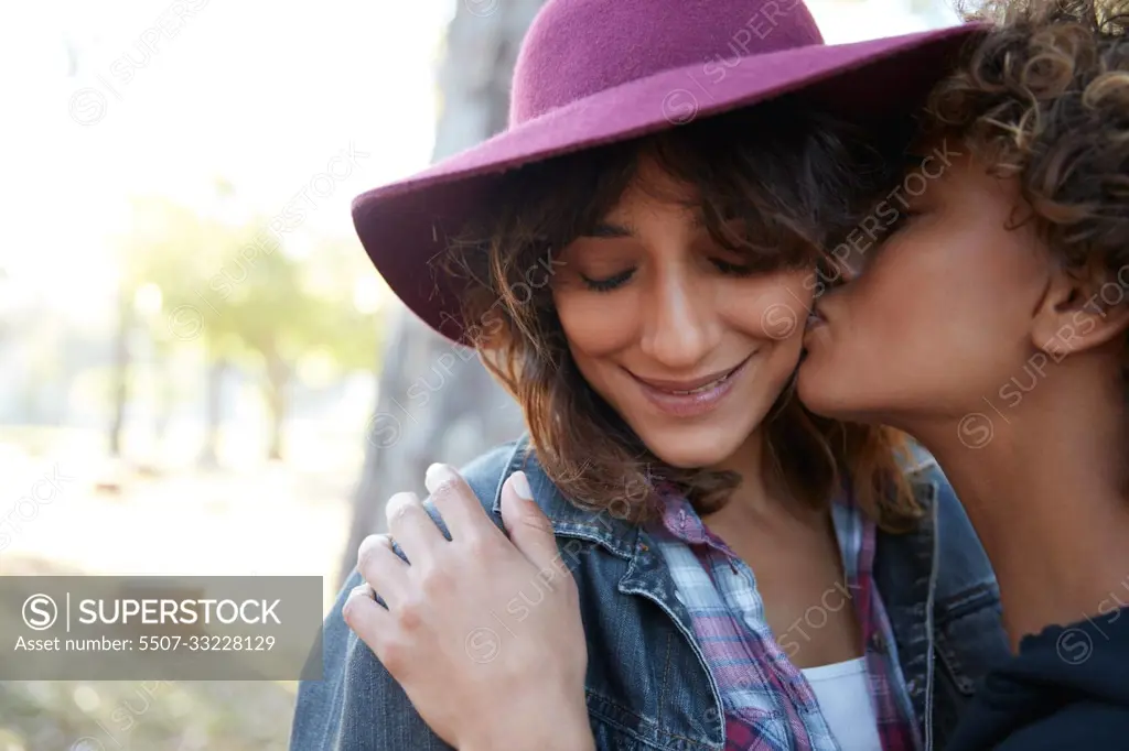 Love is love. a young couple spending the day outdoors on a sunny day.