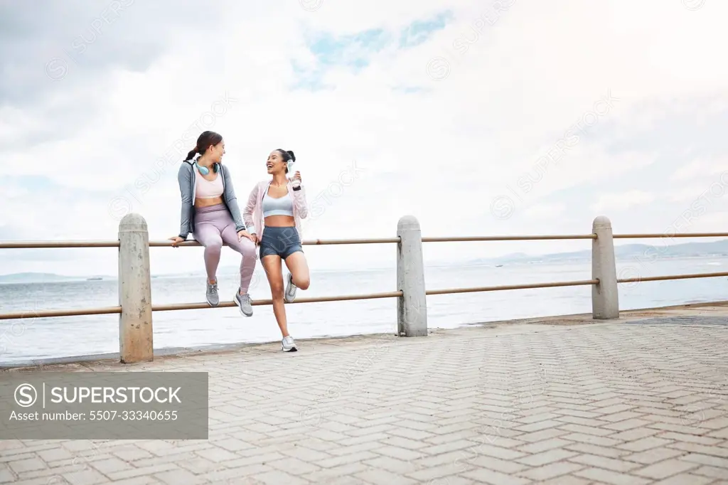 Exercise, women and friends outdoor after training, workout and fitness for health, happy and relax together. Female trainers, girls and athlete being healthy, doing cardio and sportswear or resting