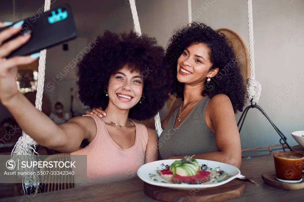 Black women, friends and phone selfie at restaurant, cafe or small business for social media. Relax, tech and females on wifi taking picture with mobile smartphone for happy memory or internet post.