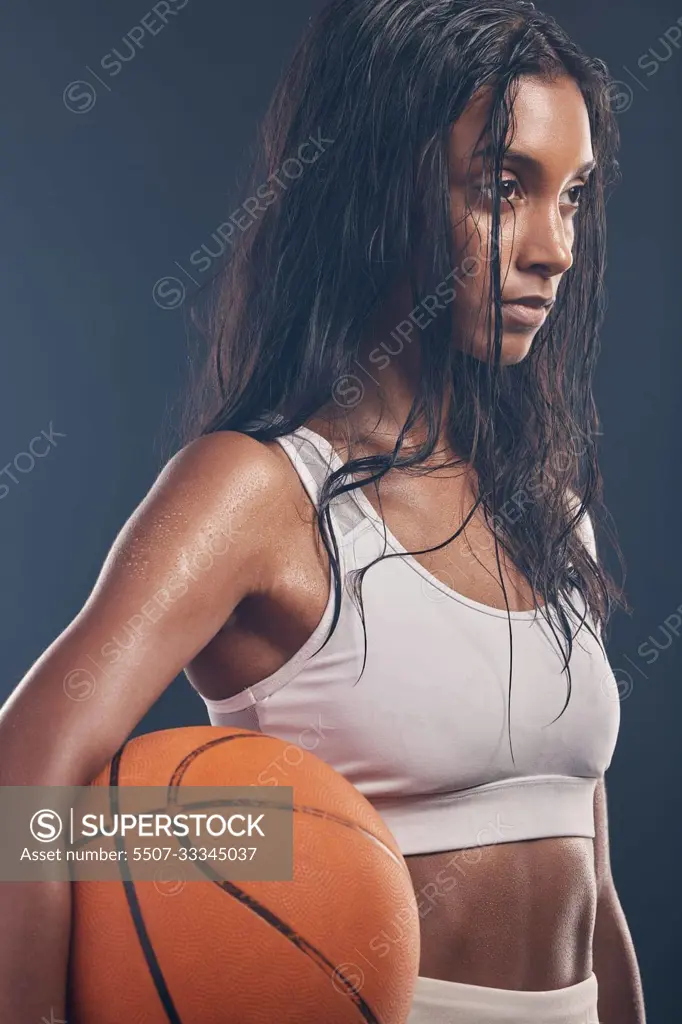 Basketball player, sports workout and studio woman for wellness challenge, practice game or fitness competition. Performance training, health exercise and athlete model isolated on dark background