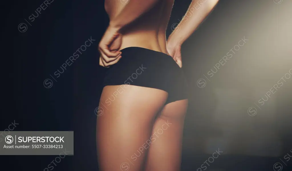 Rear view of woman, butt and black underwear on studio background for weightloss mockup, diet and slim size. Closeup female model, ass and sexy lingerie of aesthetic liposuction, beauty and fit body