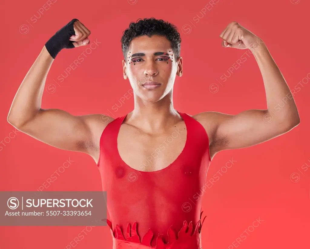 Strong, power and portrait of a gay man for boxing isolated on a red  background in a studio. Strength, training and lgbt fighter showing muscle  for a fight, self defense and sport