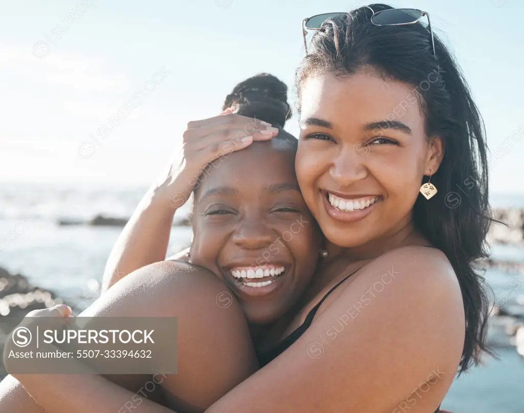 Women, portrait or friends hug by beach, sea or ocean in summer holiday bonding, support vacation or girls travel location. Smile, happy or black people in embrace, social gathering or relax nature