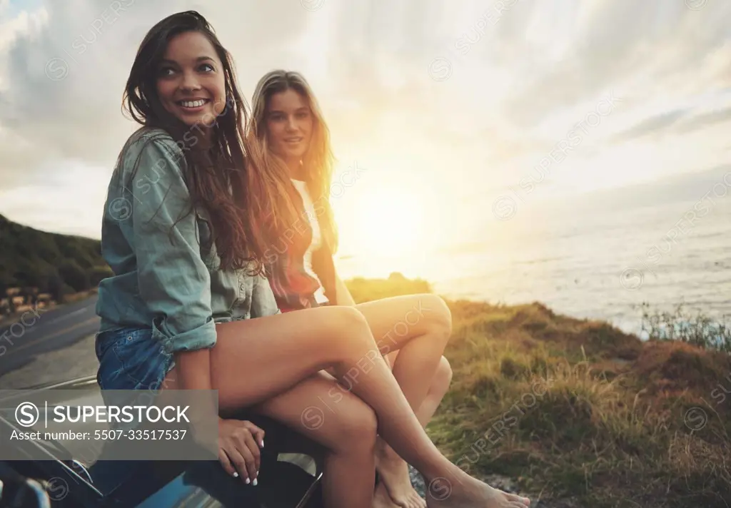 Friends at sunset, women on car with travel to beach, road trip portrait and outdoor with nature and sea holiday. Adventure mockup, freedom and gen z youth on summer vacation, happy with lens flare