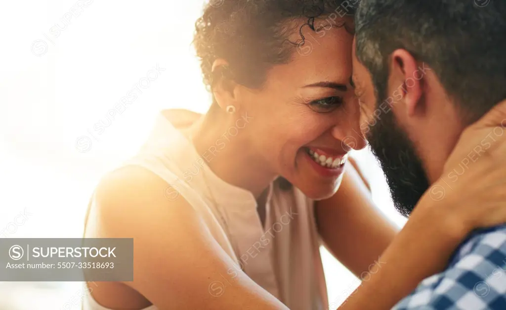 Love, marriage and forehead to face of couple for commitment, loving embrace and trust outdoors. Smile, happiness and intimate man and woman for romance on holiday, vacation and weekend together