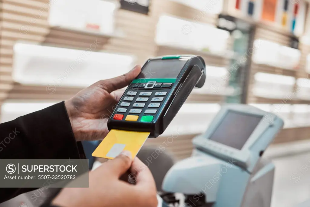 Hands, credit card and machine for banking transaction, ecommerce or payment at clinical store. Hand of customer making purchase or debit insert for electronic pay, bank or buying at optometry shop