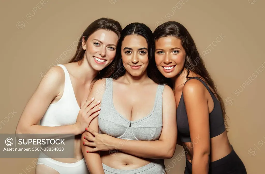 Smiling young arabic spanish and caucasian women in different