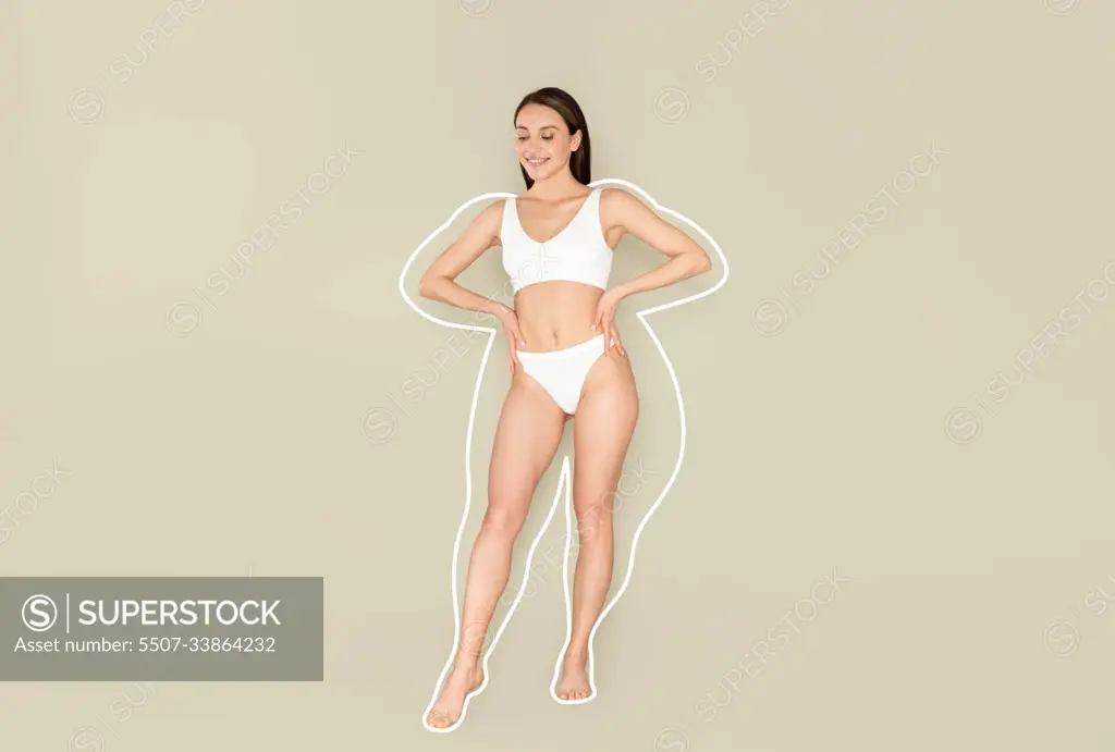 Happy well-fit woman enjoying results of healthy slimming diet