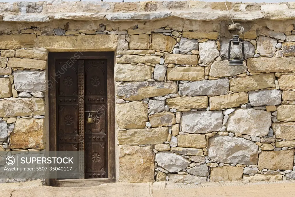 Dubai UAE Detail of stone huts on display at Heritage Village in Bur Dubai